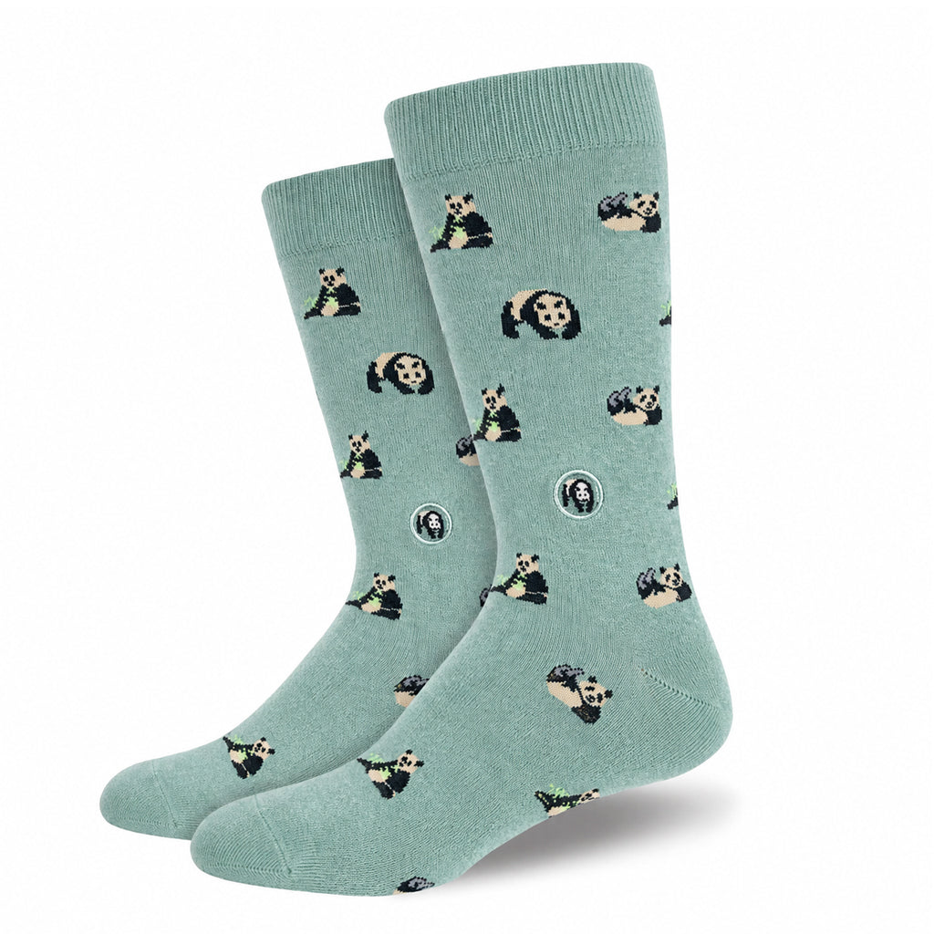 A pair of mint green size medium adult graphic crew socks featuring a pattern of giant pandas.