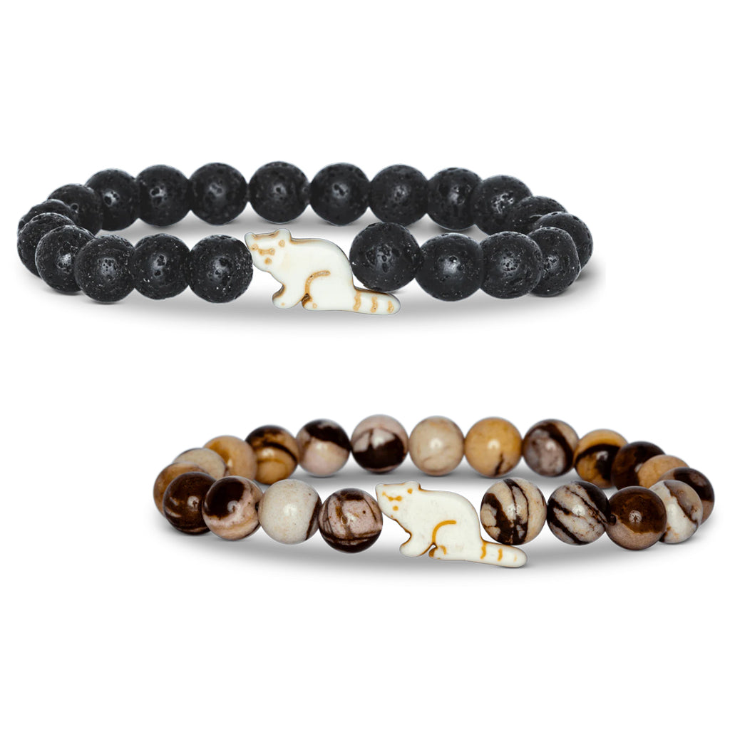 Two beaded bracelets in Himalaya Stone and Lava Stone with a red panda-shaped charm.