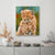 Canvas Print Painting of a cheetah cub on a wall above a cabinet with decorative items.