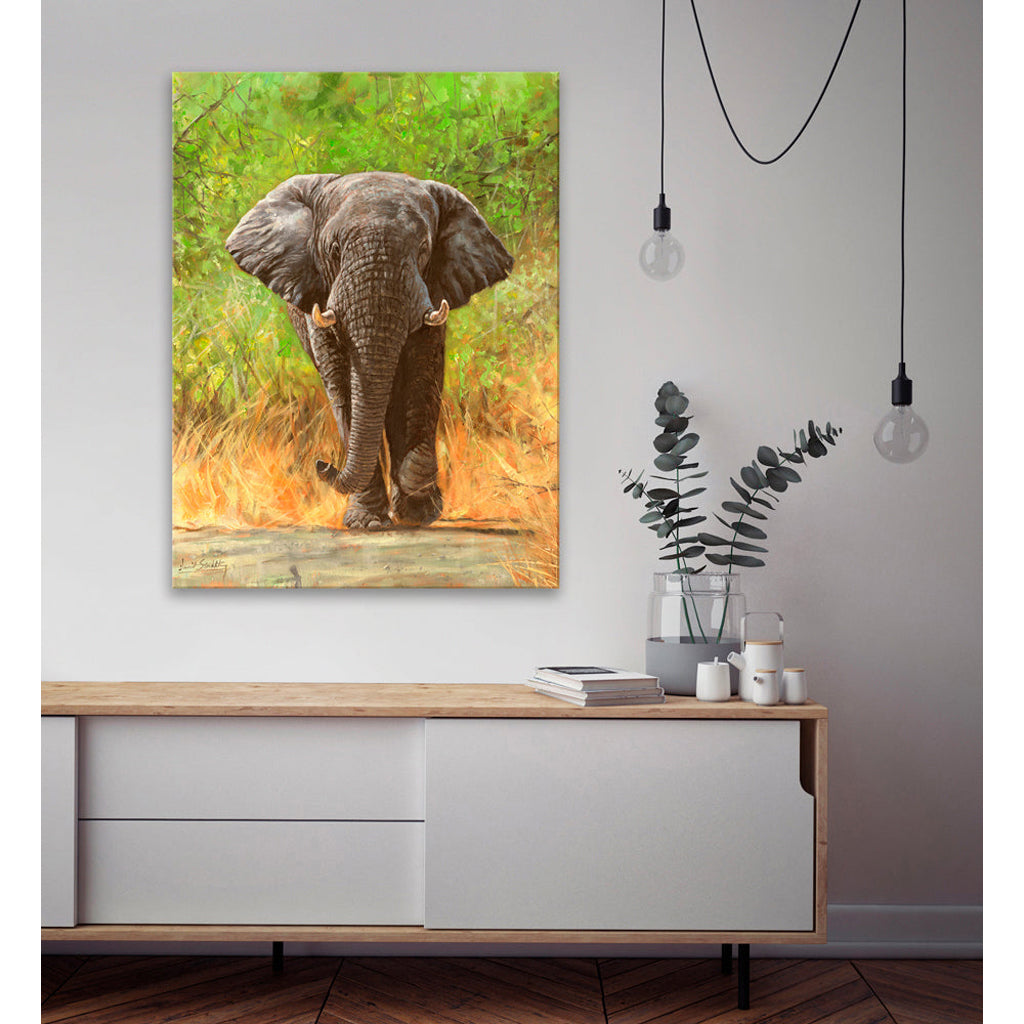 Elephant Canvas Print painting on a wall above a wooden console table with decorative items.