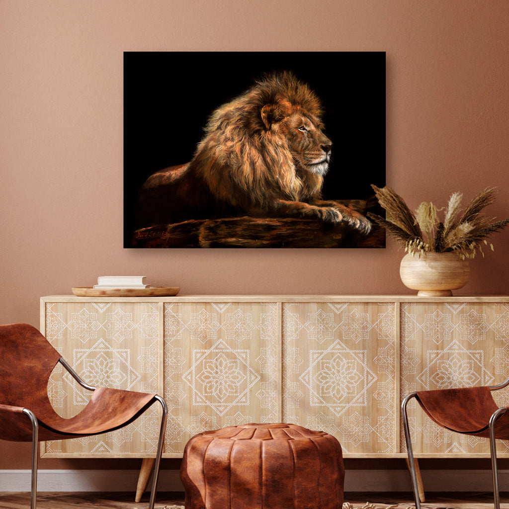Lion Canvas Print painting on a wall above a decorative cabinet with a brown chair and ottoman.