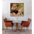 Dining area with a table and chairs, and a Canvas Print painting of a lion on the wall.