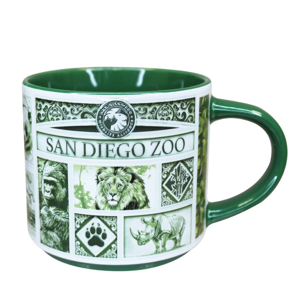 A green Delft-style ceramic San Diego Zoo &amp; Safari Park mug featuring animal illustrations and the San Diego Zoo logo, shown on a plain white background.
