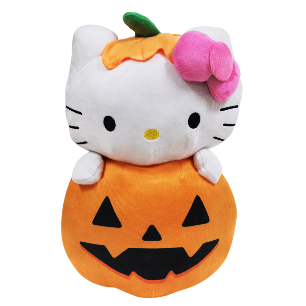 Hello Kitty plush toy in a Halloween pumpkin costume on a white background