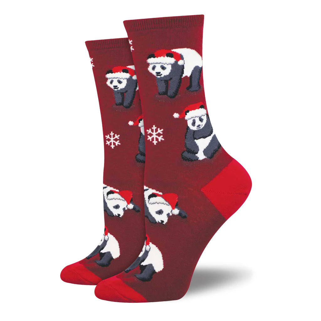Red socks with panda illustrations and Santa hats on a white background