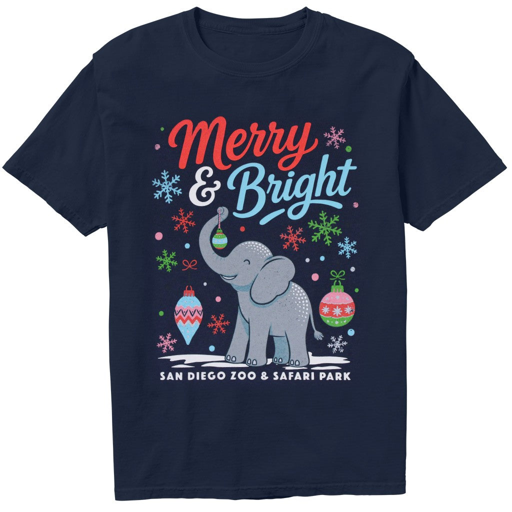 A navy blue short-sleeve t-shirt with a festive Christmas graphic featuring a gray elephant, colorful ornaments, snowflakes, and the text 'Merry &amp; Bright' and 'SAN DIEGO ZOO &amp; SAFARI PARK'.