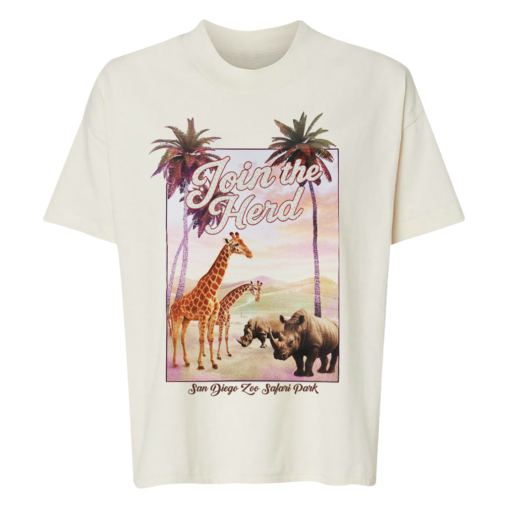 Join the Herd Cropped Boxy Ladies Tee. White t-shirt with a graphic of giraffes, rhinos, and palm trees with 'Join the Herd' text on a white background.