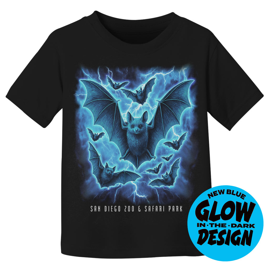Black t-shirt with glowing bat design and San Diego Zoo & Safari Park text, featuring a blue glow-in-the-dark effect.